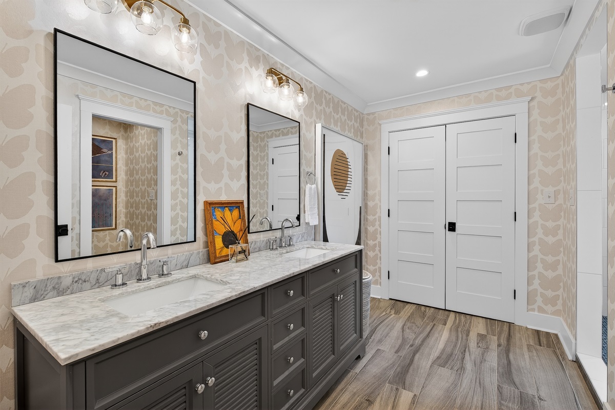 Master bathroom with dual vanity and walk-in shower—designed for comfort and space