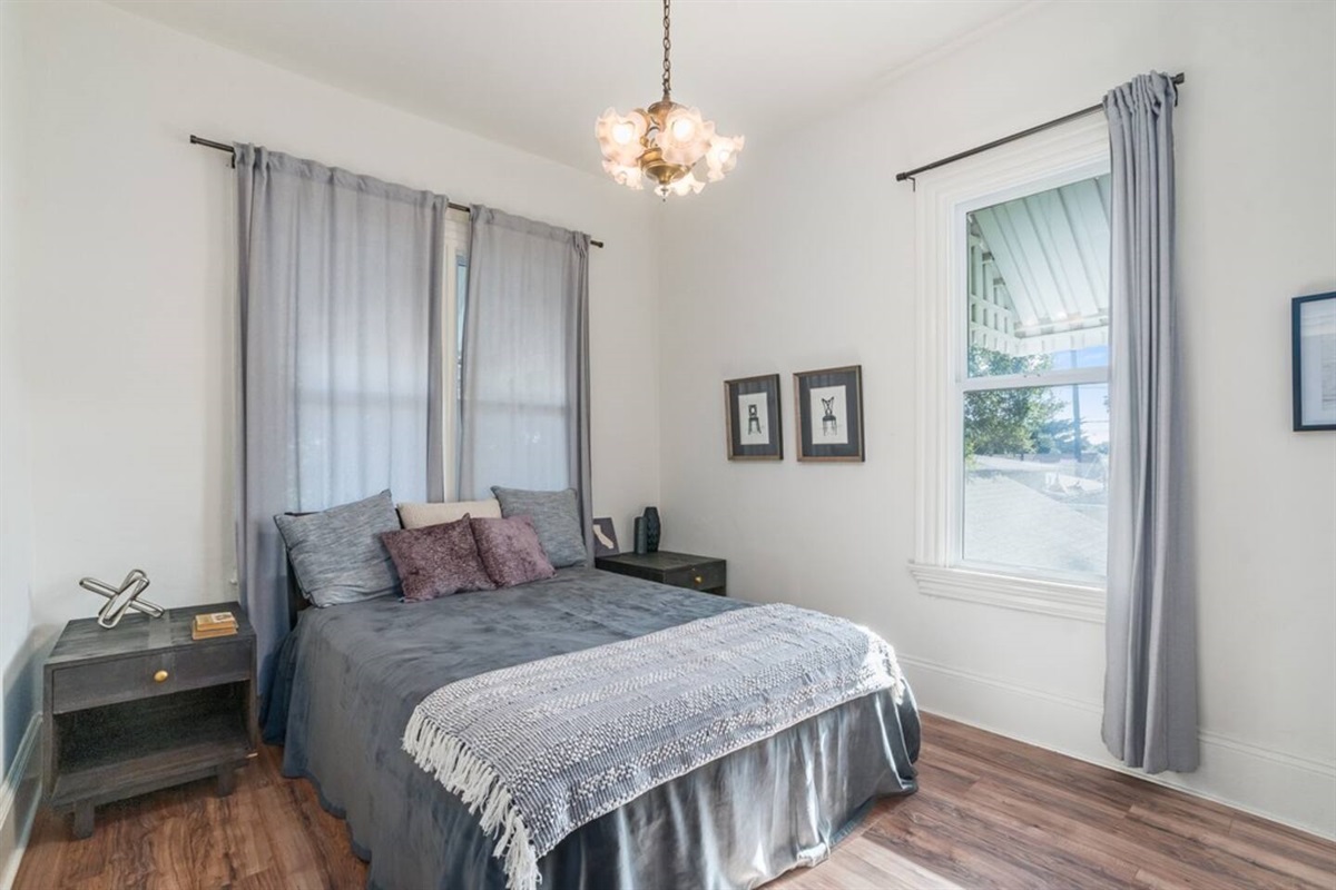 Primary bedroom with 12 foot ceilings