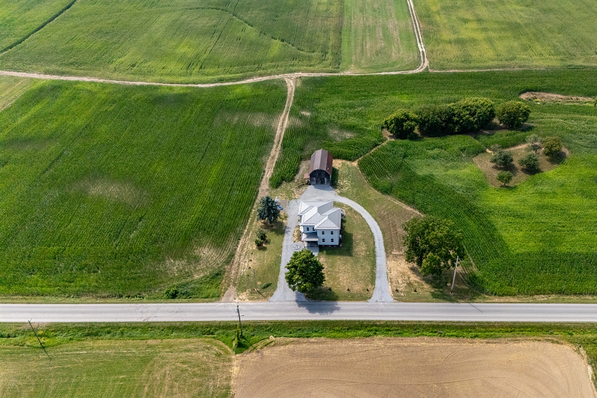 Bird’s-eye view showcasing endless farmland and privacy—ideal for serene country living.