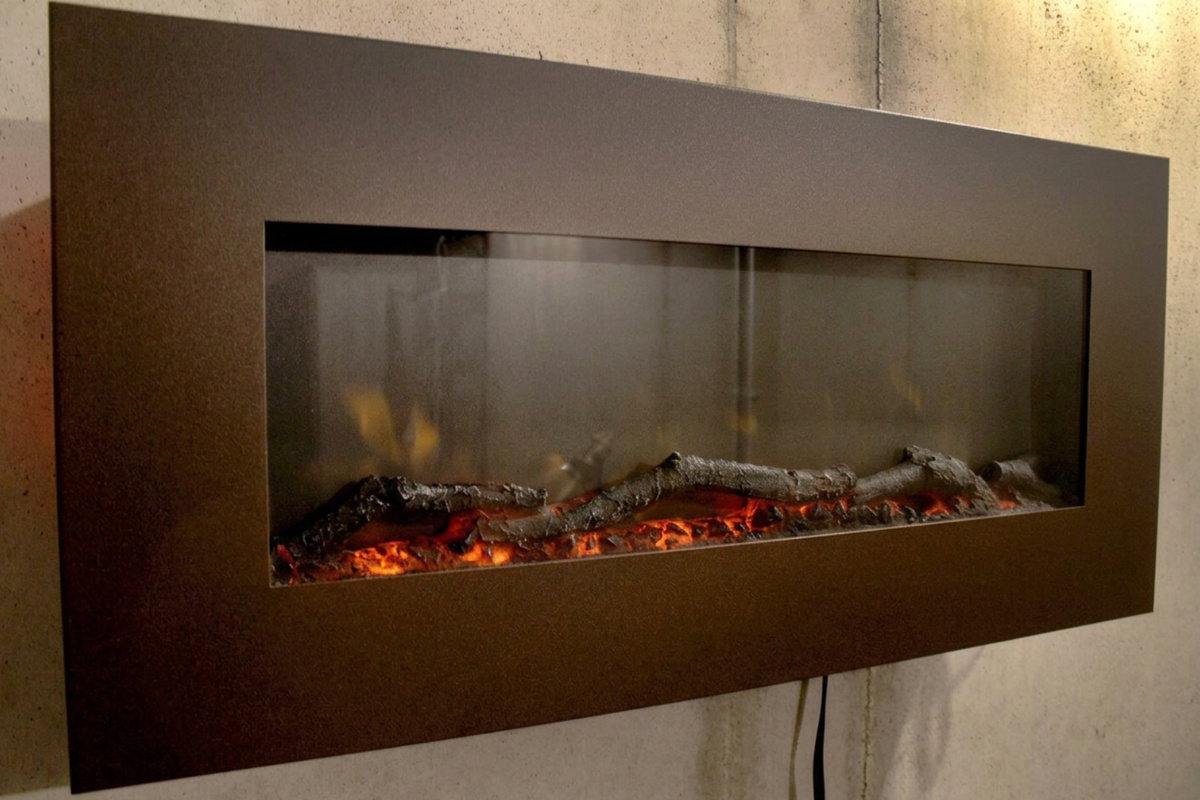 Electric fireplace in tornado shelter / secondary living area on lower level can provide a bit of heat on colder days
