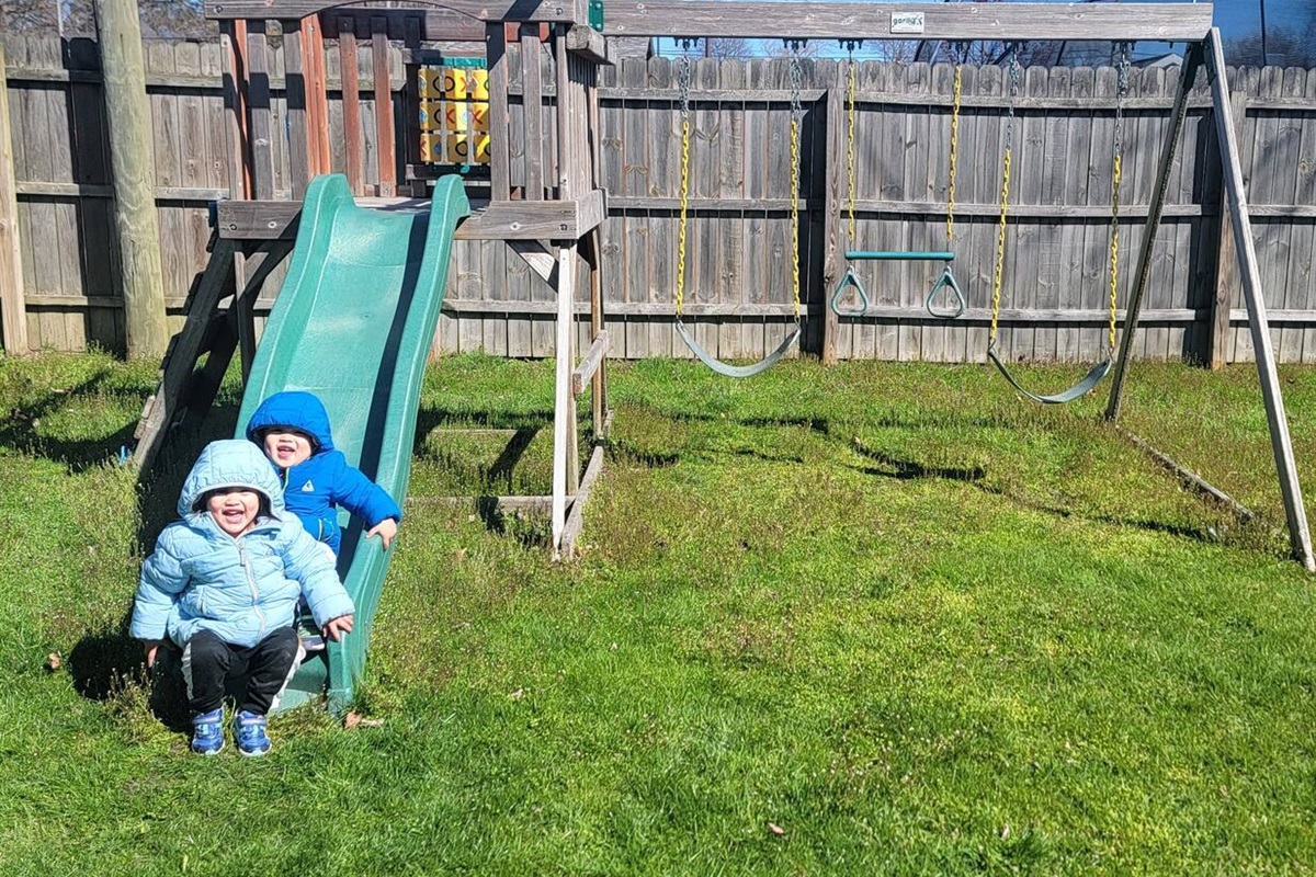 Relax knowing the kids can play freely in a fenced backyard designed for safe, happy outdoor fun.
