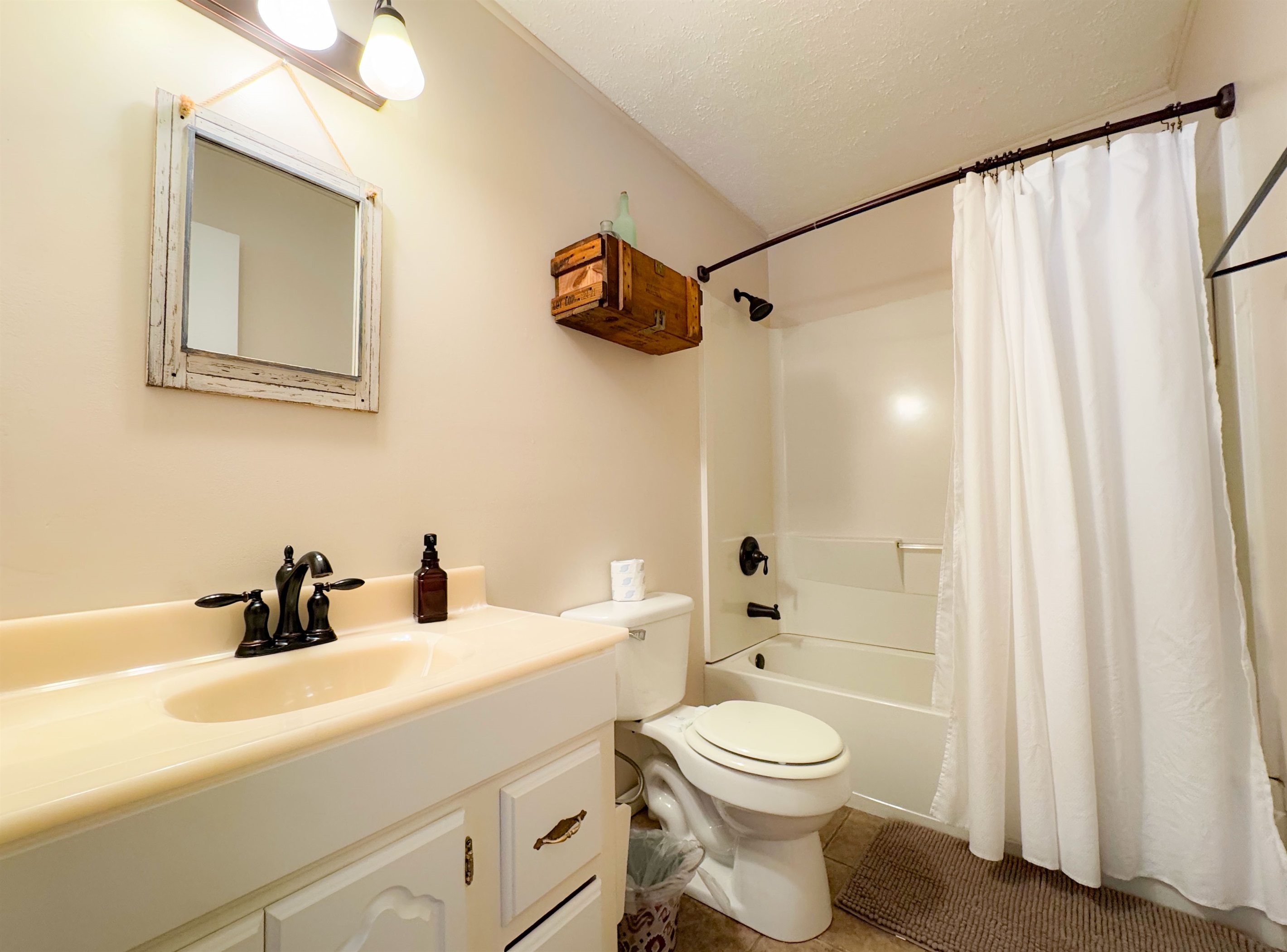 Full bathroom at the Ol Gun Range Cabin