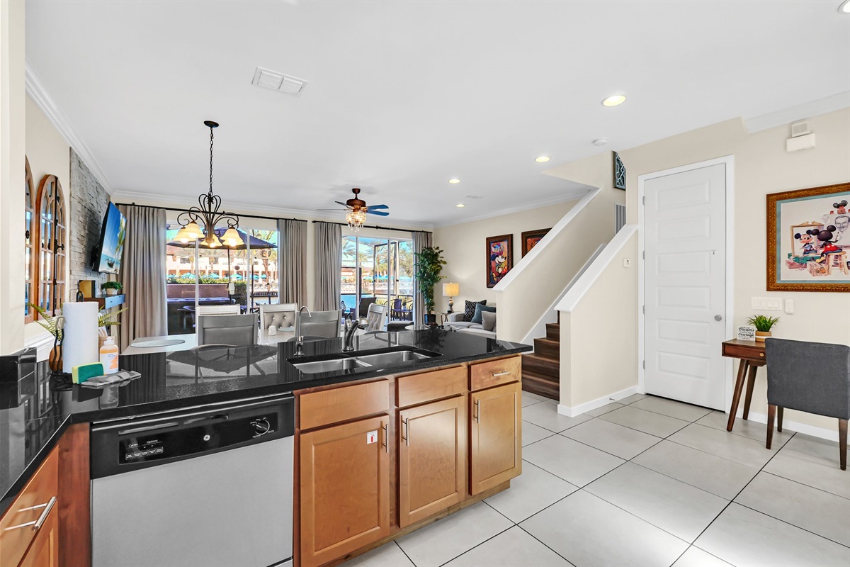 Kitchen overlooking living/dining room and stairs