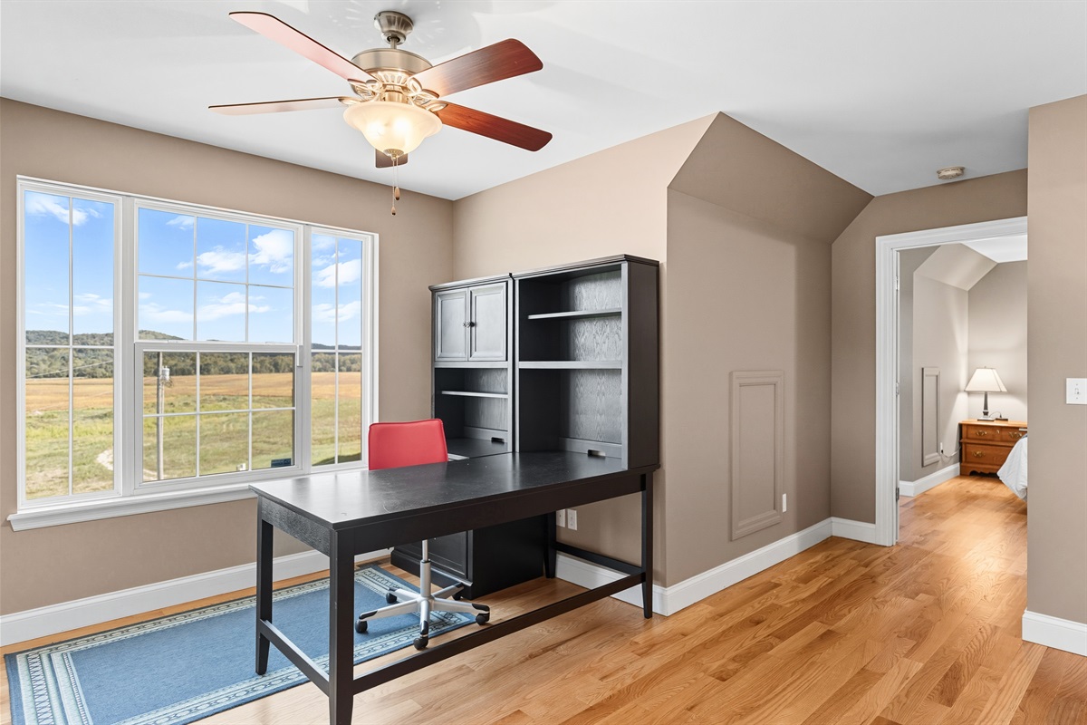 Dedicated work space with a view to catch up on your Zoom meetings or email.