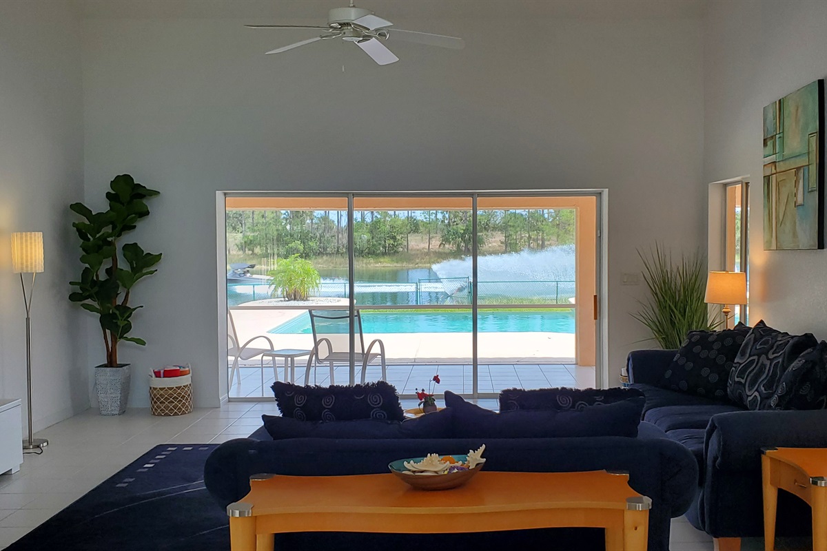 View from Living Room of pool and lake
