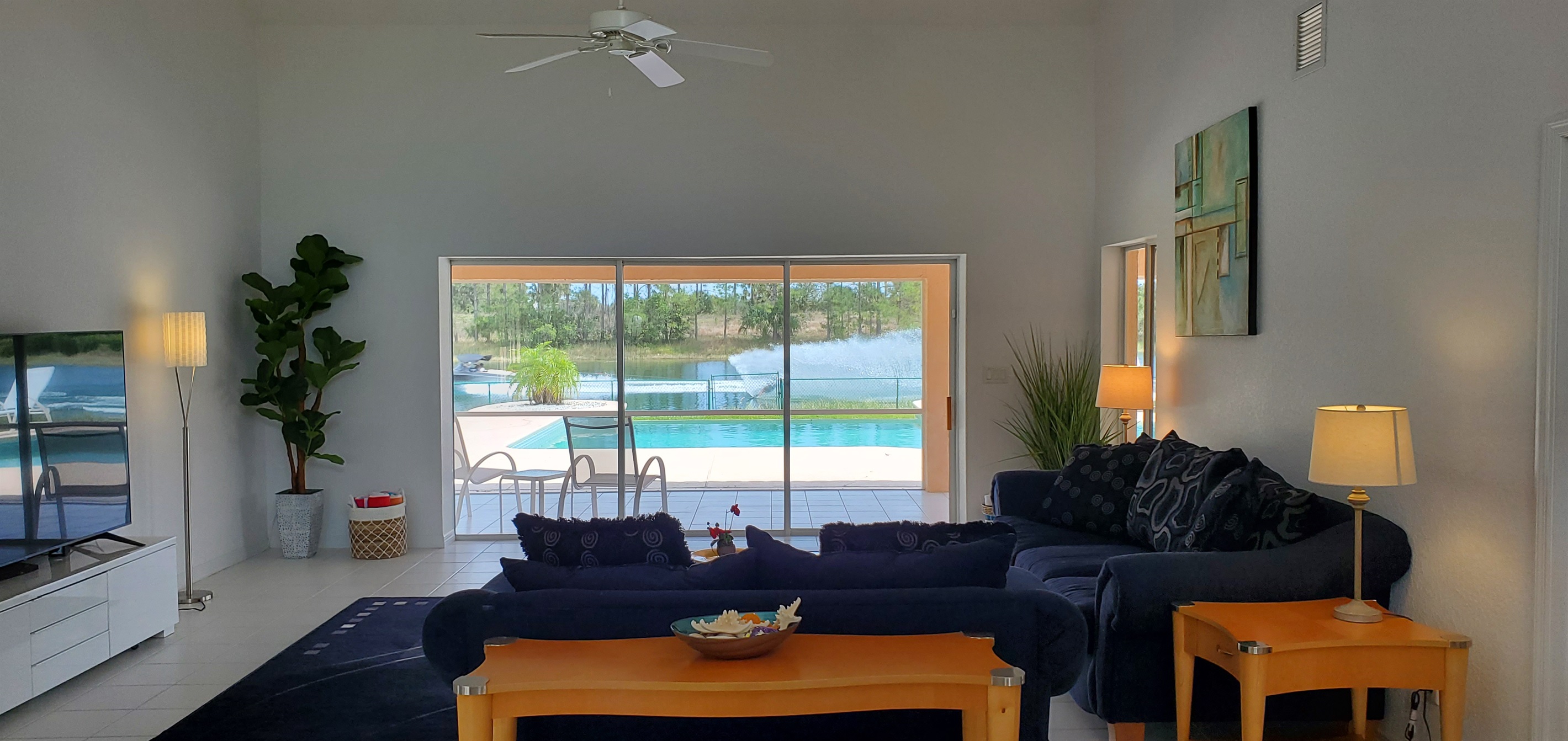 View from Living Room of pool and lake