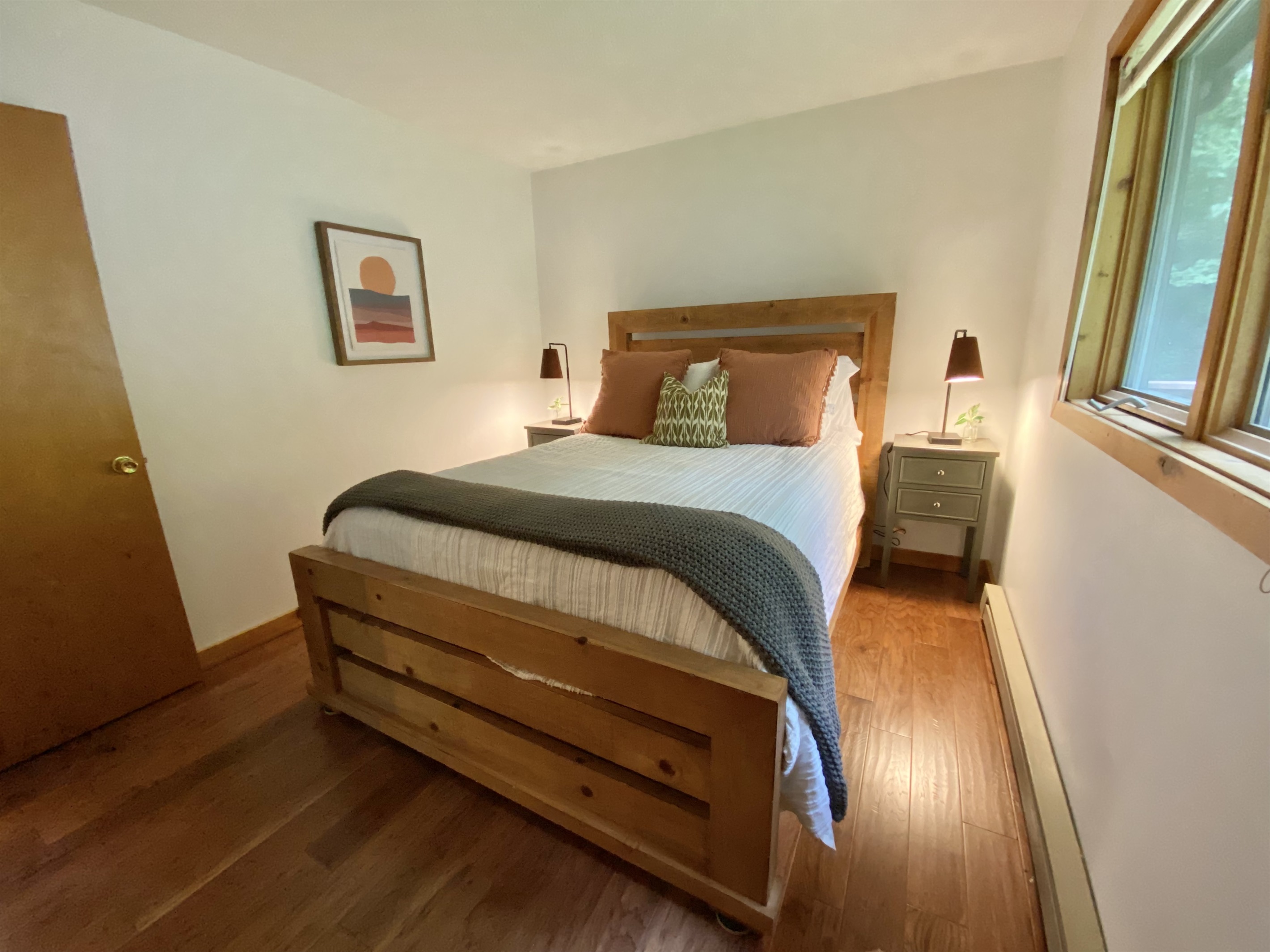 Queen Bed in Bedroom 2 just outside the kitchen with ensuite bathroom