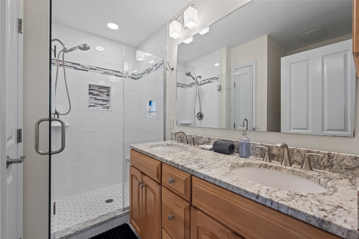 En-suite bathroom with double vanity and walk-in shower