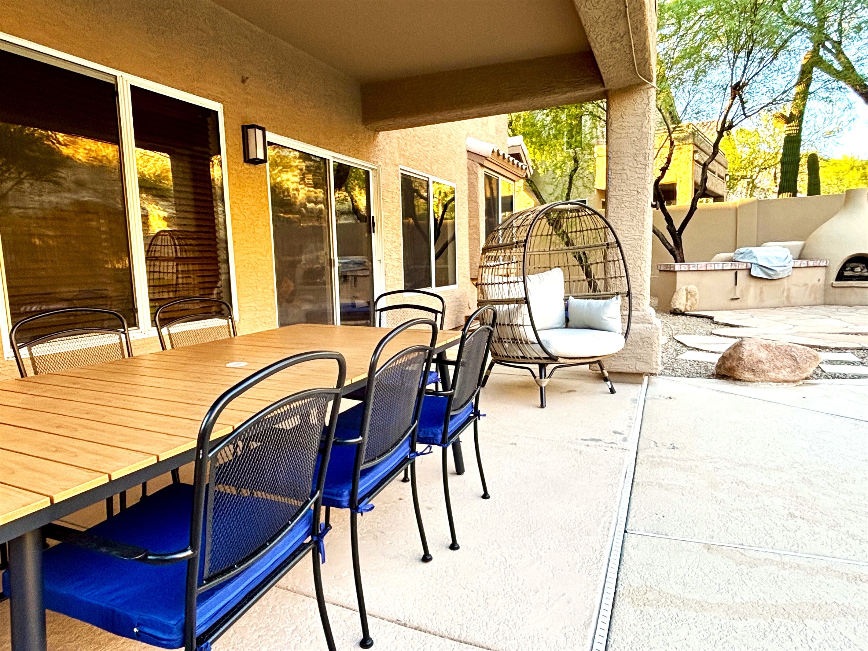 Backyard dining table and ultra comfy egg chair