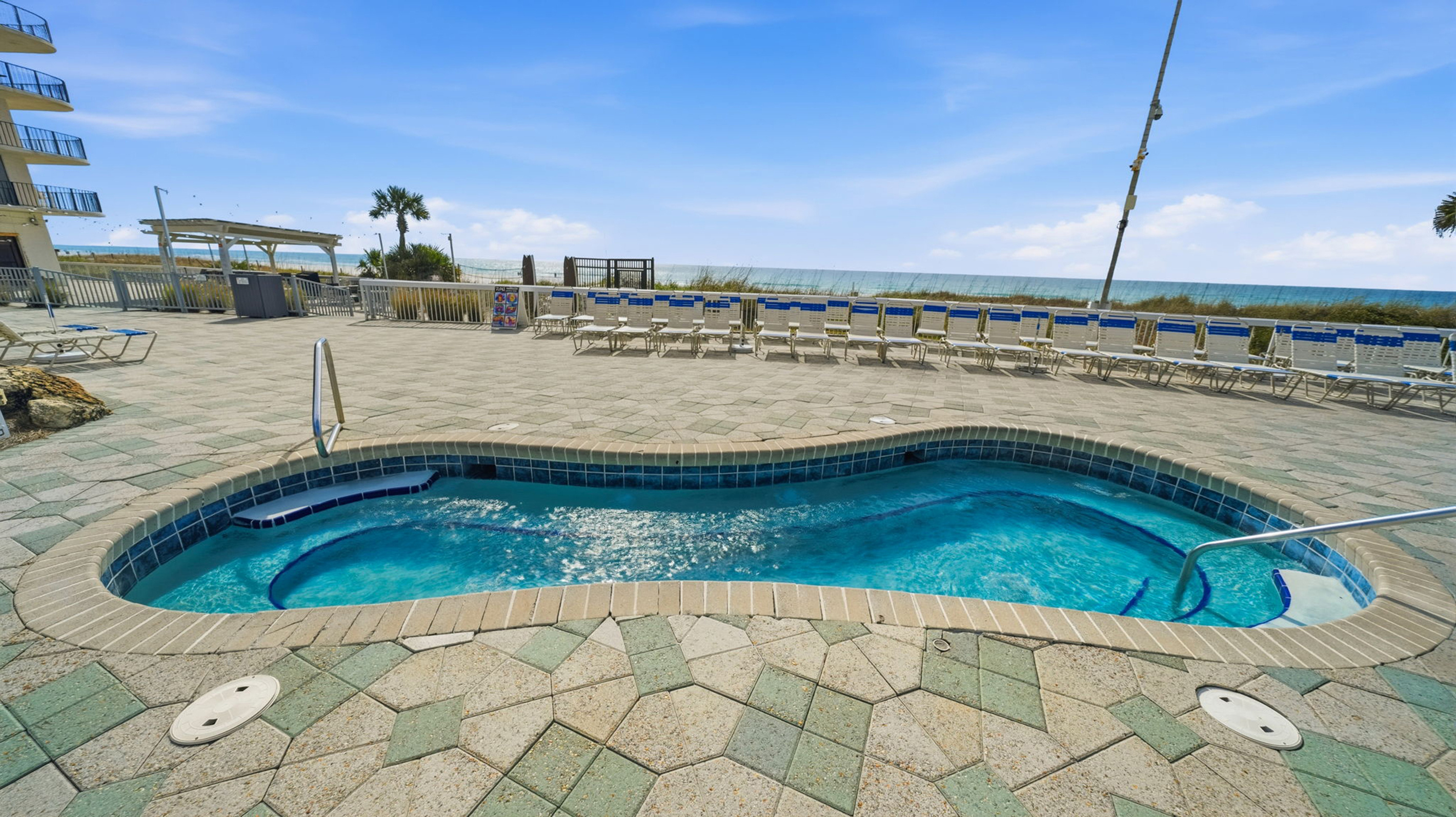 One of four beachfront hot tubs