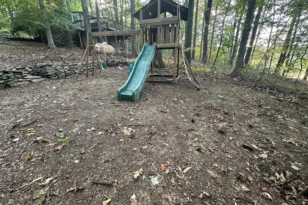 Nestled among mature trees, the property offers a peaceful woodland vibe plus a charming children’s play area—ideal for families to relax while the kids explore and enjoy nature.