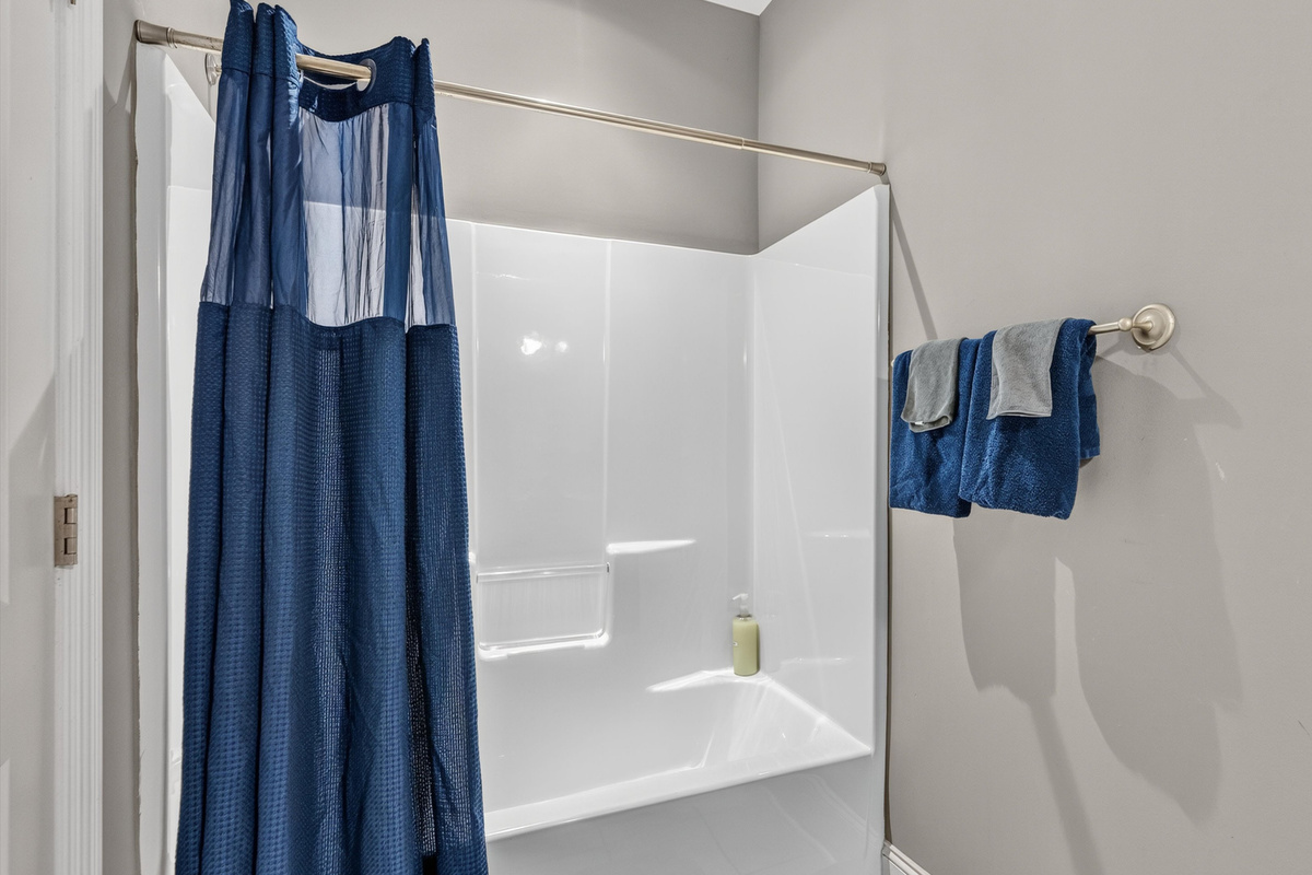 Bath 2: The bathroom has a comfortable tub/shower
