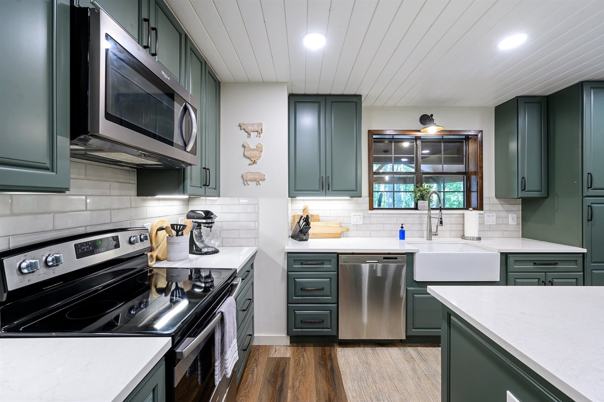 The kitchen provides everything you would need to prepare a meal.  Even a Kitchen Aid mixer!