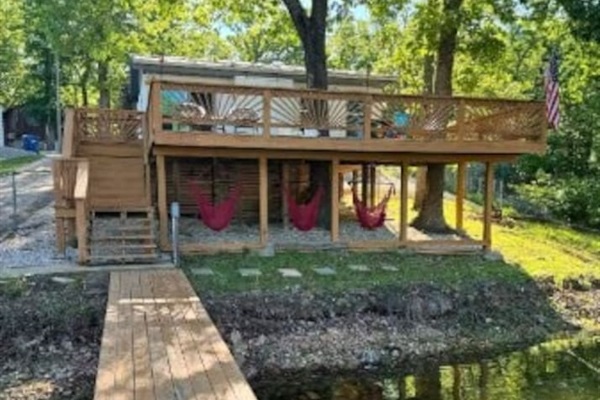 Granary‑house‑backyard‑deck‑hammocks‑lake‑view