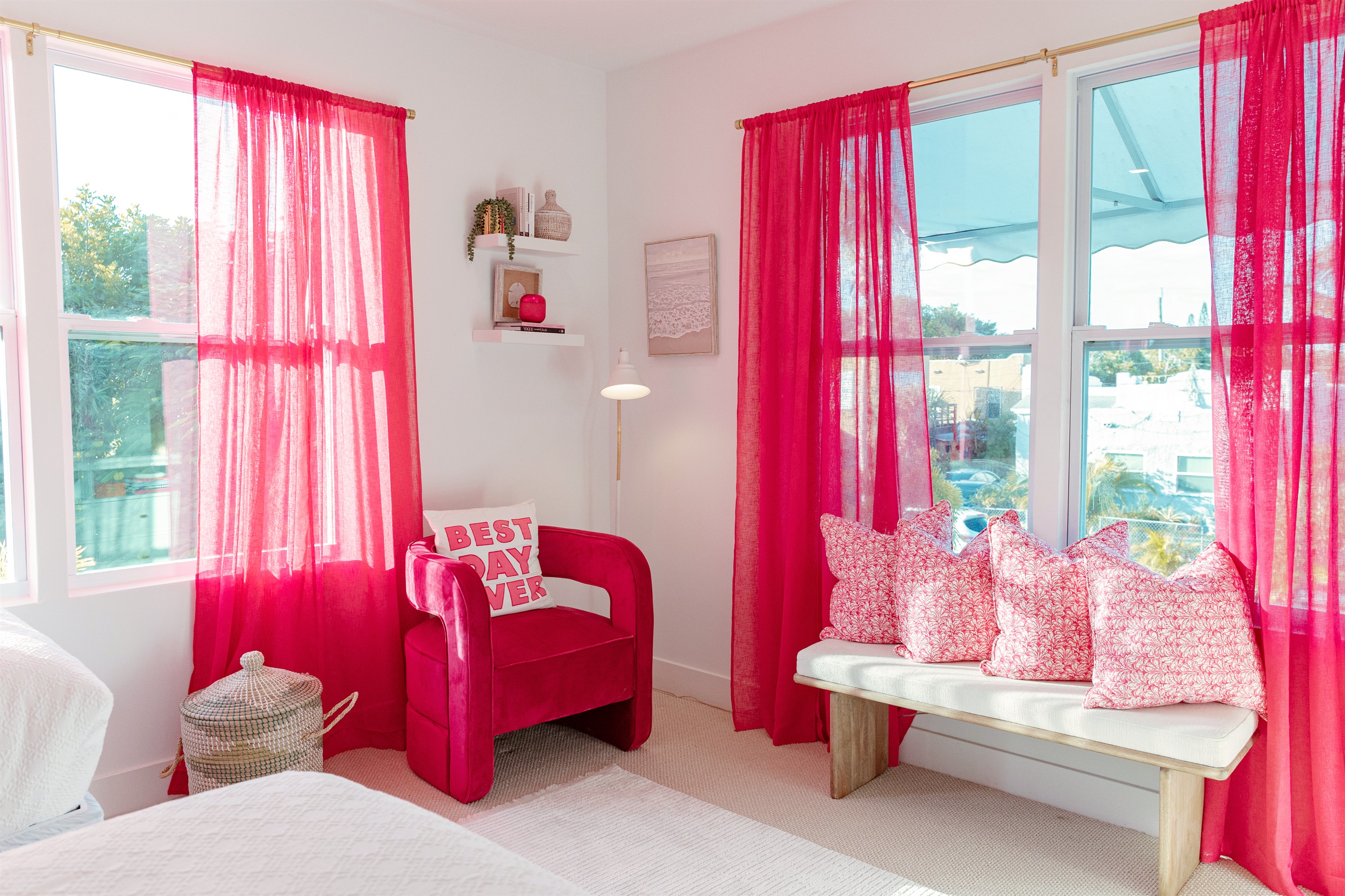 The third bedroom has themes of Palm Beach in pink and red, a stylish and fun way to be immersed in the local culture.