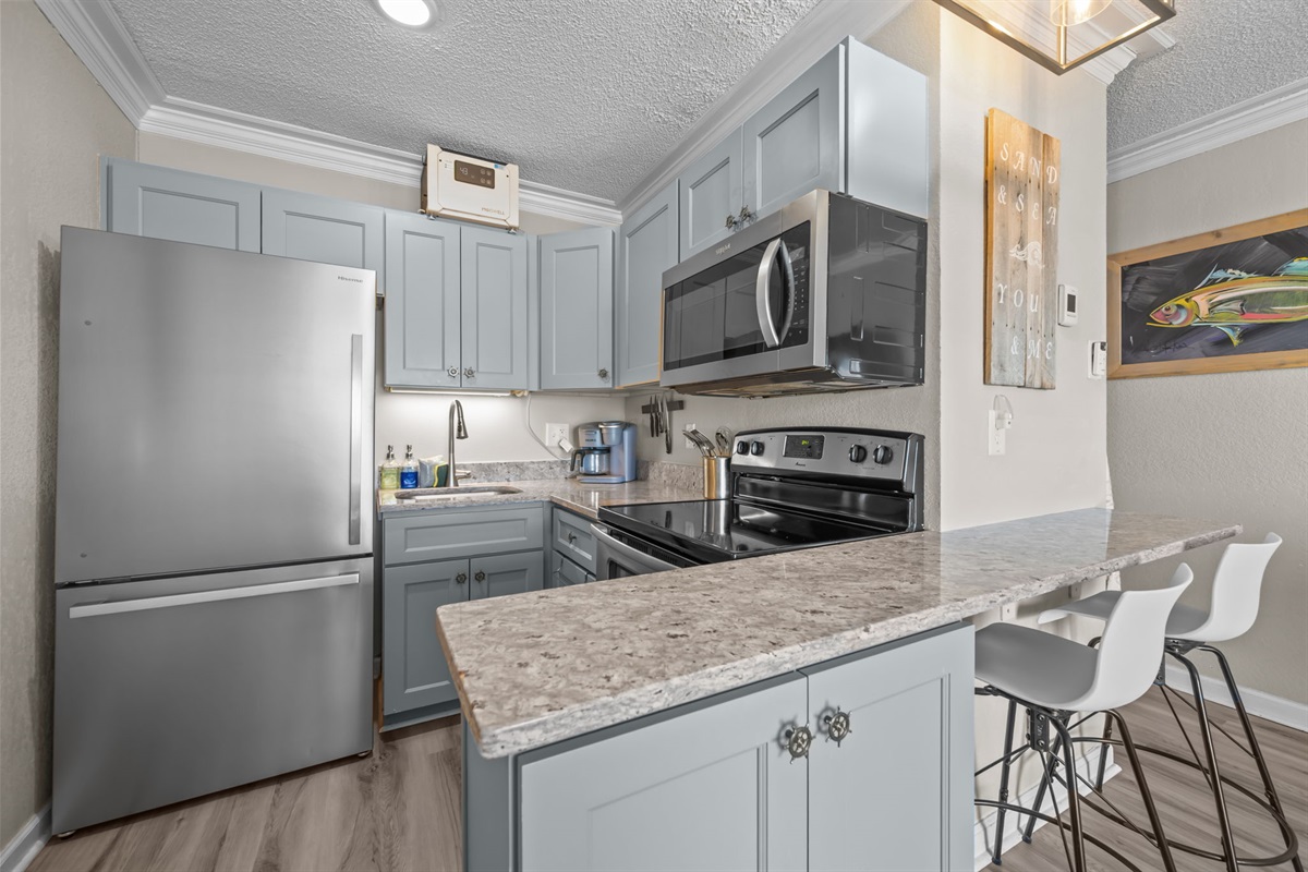Functional kitchen with stone countertops