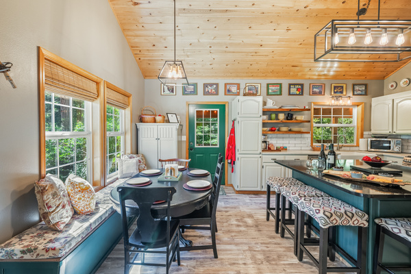 Dining area has seating for 6 and island has seating for 5