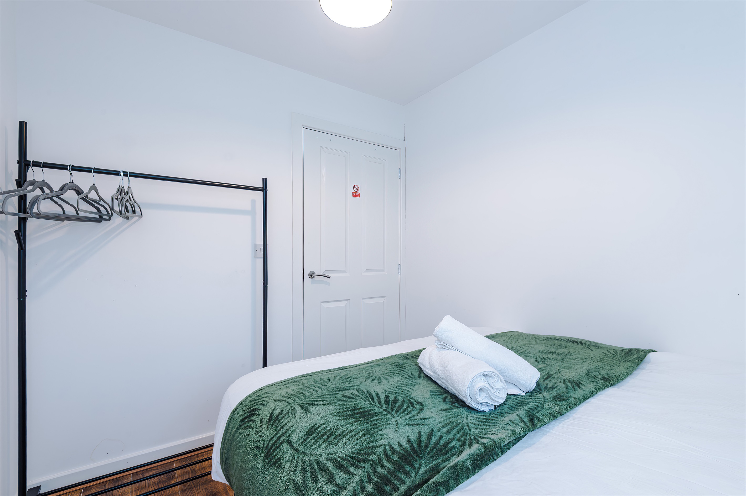 Each bedroom benefits from a clothes rail and hangers