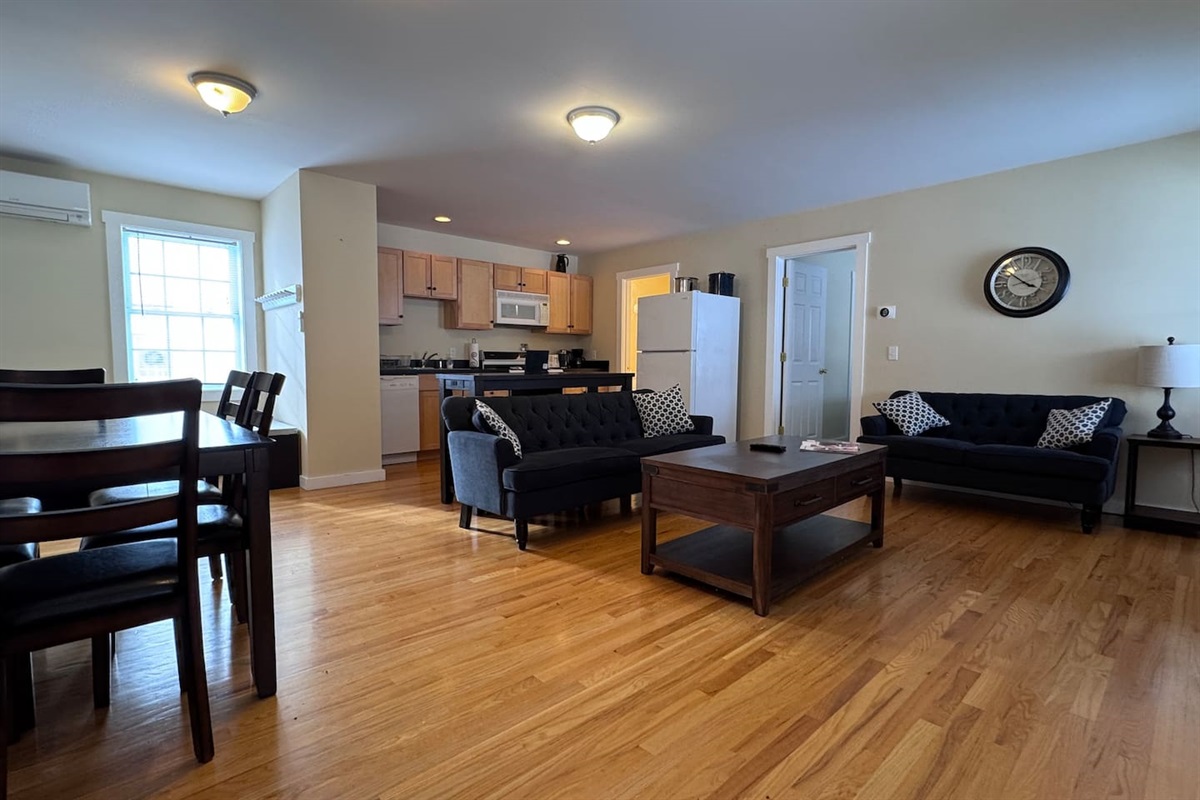 Open-concept apartment with Living room, kitchen, and dining area