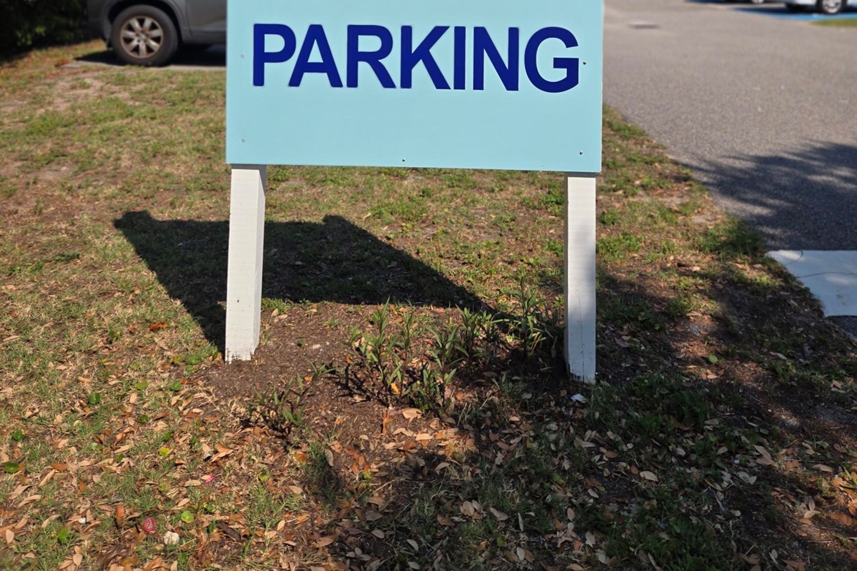 Only park in the labeled, designated parking lots for the Atlantica Resort - look for this sign