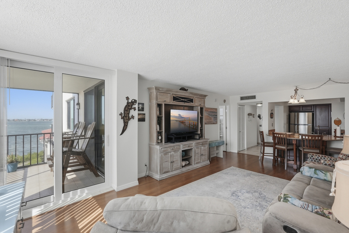 With an open and inviting layout, the living area is a comfortable place to gather, relax, and enjoy a slower pace of coastal living.