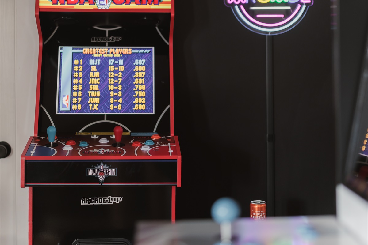 Game Room Fun: Challenge friends to classic arcade battles under neon lights!