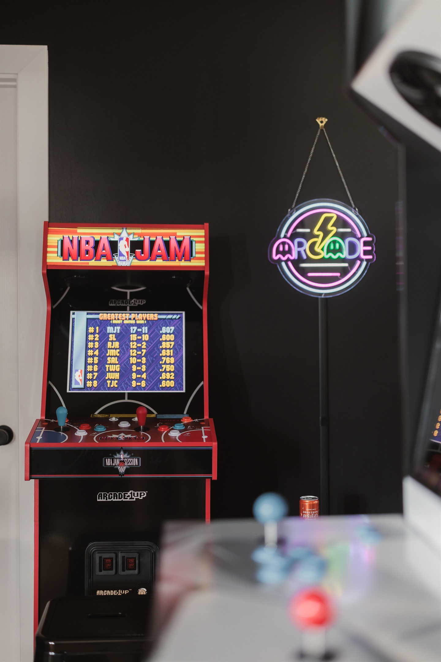 Game Room Fun: Challenge friends to classic arcade battles under neon lights!