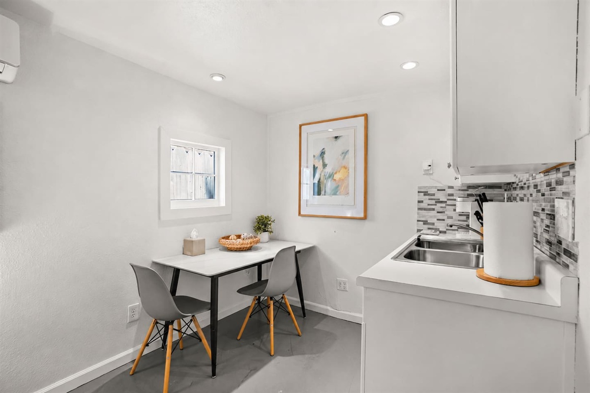 Convenient kitchenette with coffee station and essentials for easy mornings and light meals.
