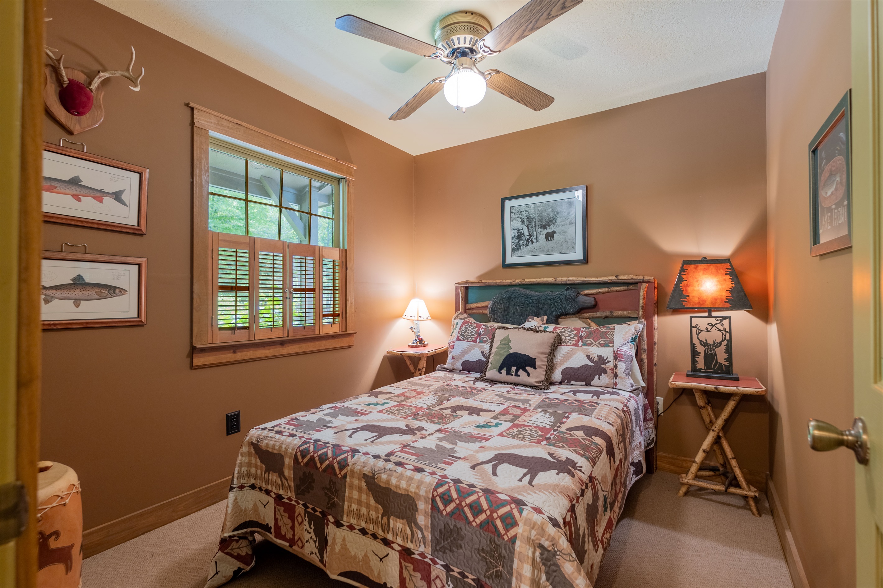 The cozy full bedroom offers a quiet place to unwind after a day by the creek.