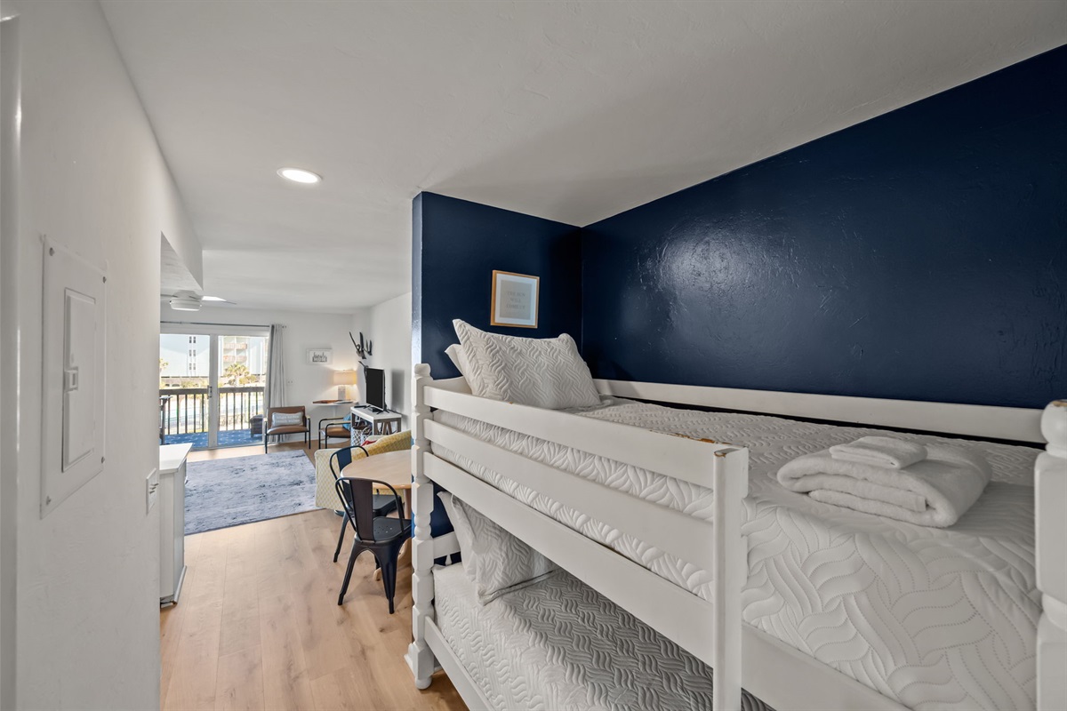 Compact bunk area with beach vibes
