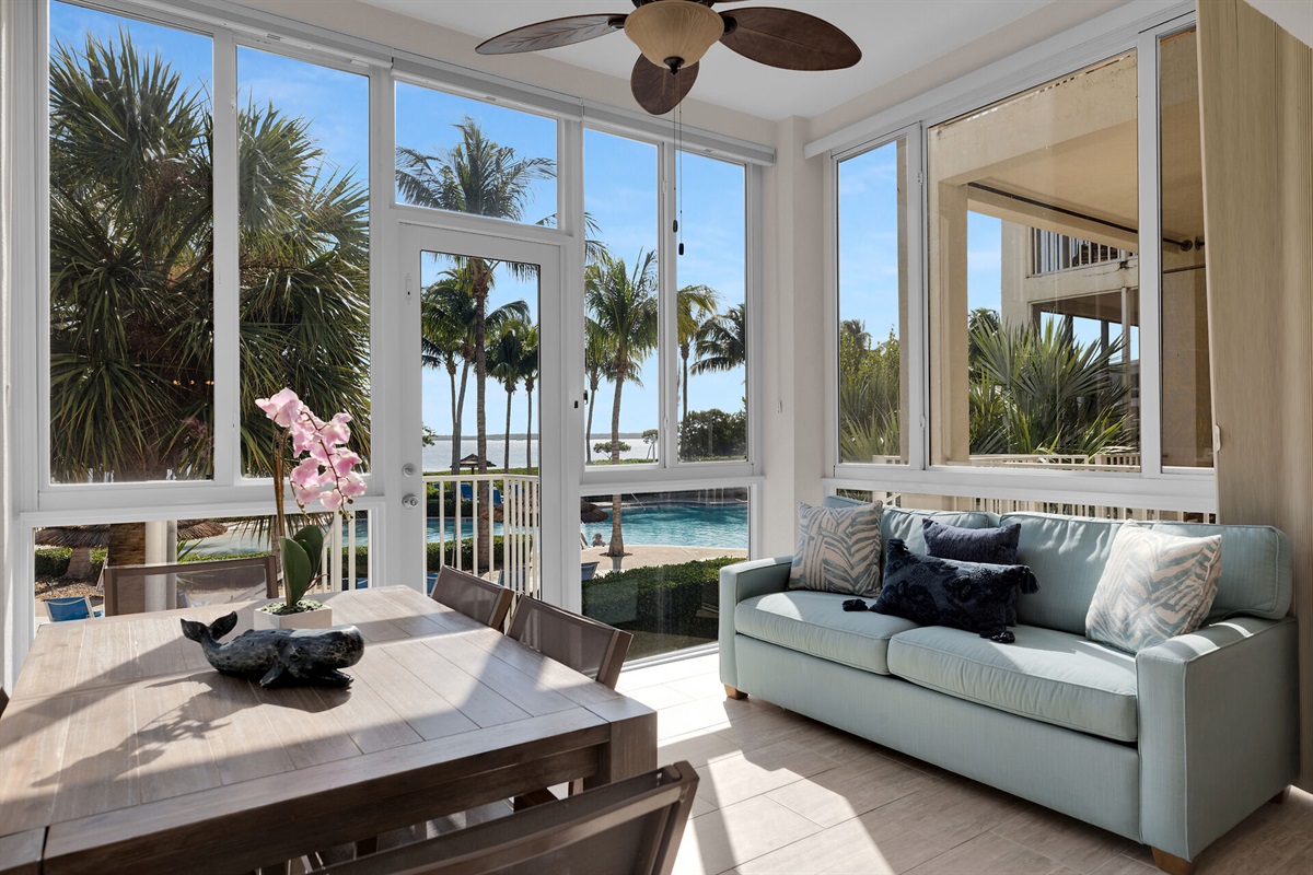 Sunroom with private stairway entrance to the largest pool in the Florida Keys overlooking the ocean.