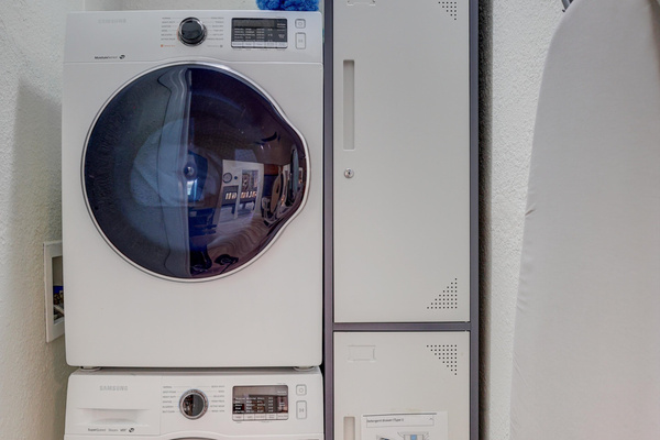 Laundry room with Ironing board, iron, steam iron and door pad for steam iron