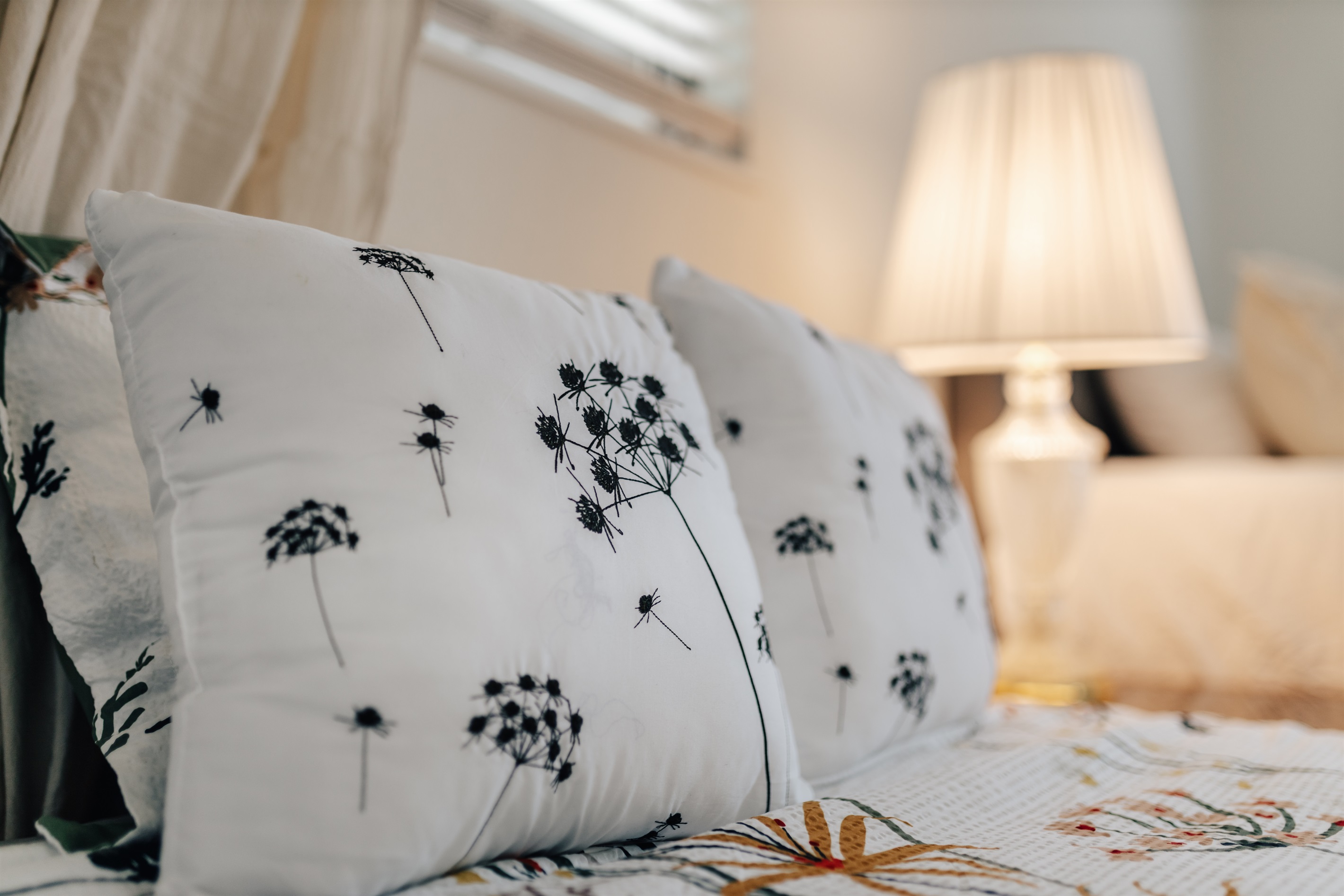 comfy beds and antique lights