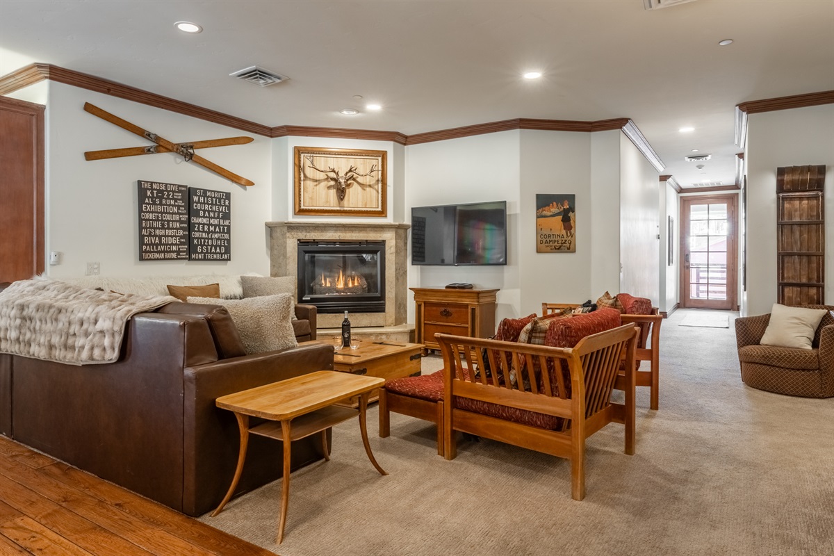 The living area is an ideal spot to unwind after a day on the slopes or enjoy a quiet evening in with family and friends.