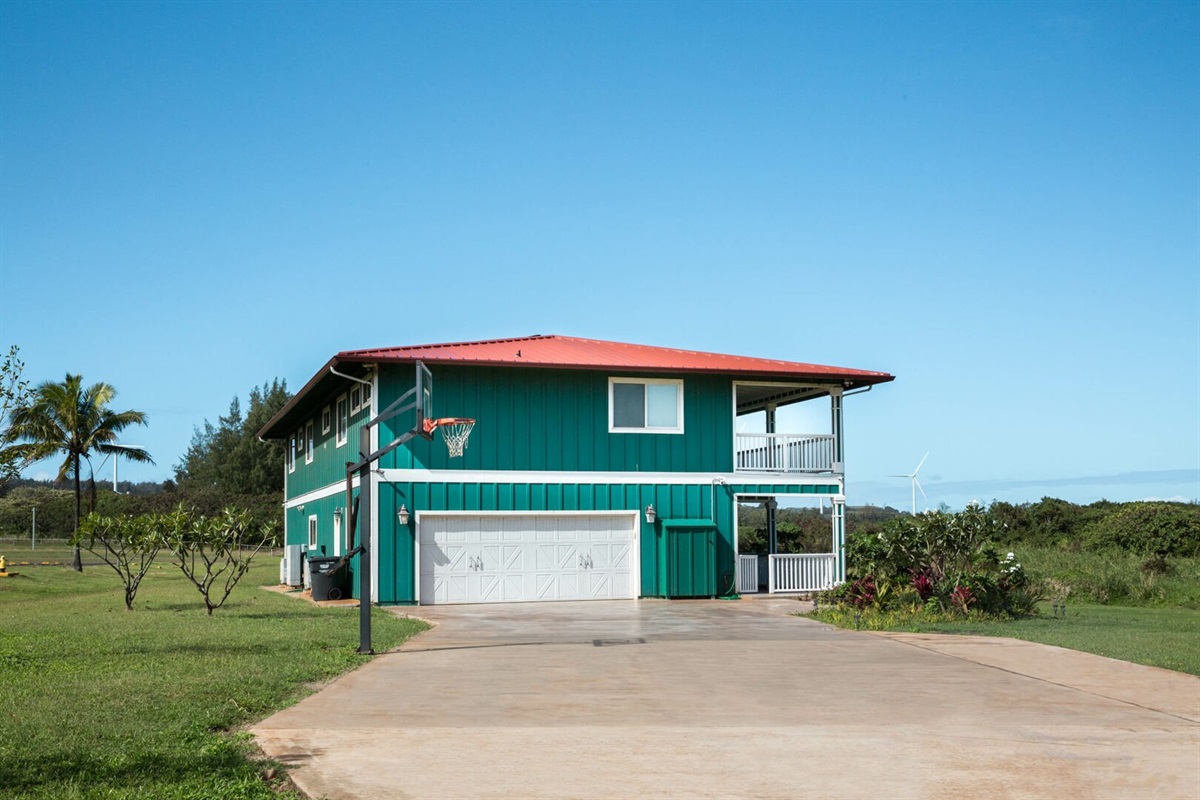 Driveway, garage and basketball hoop