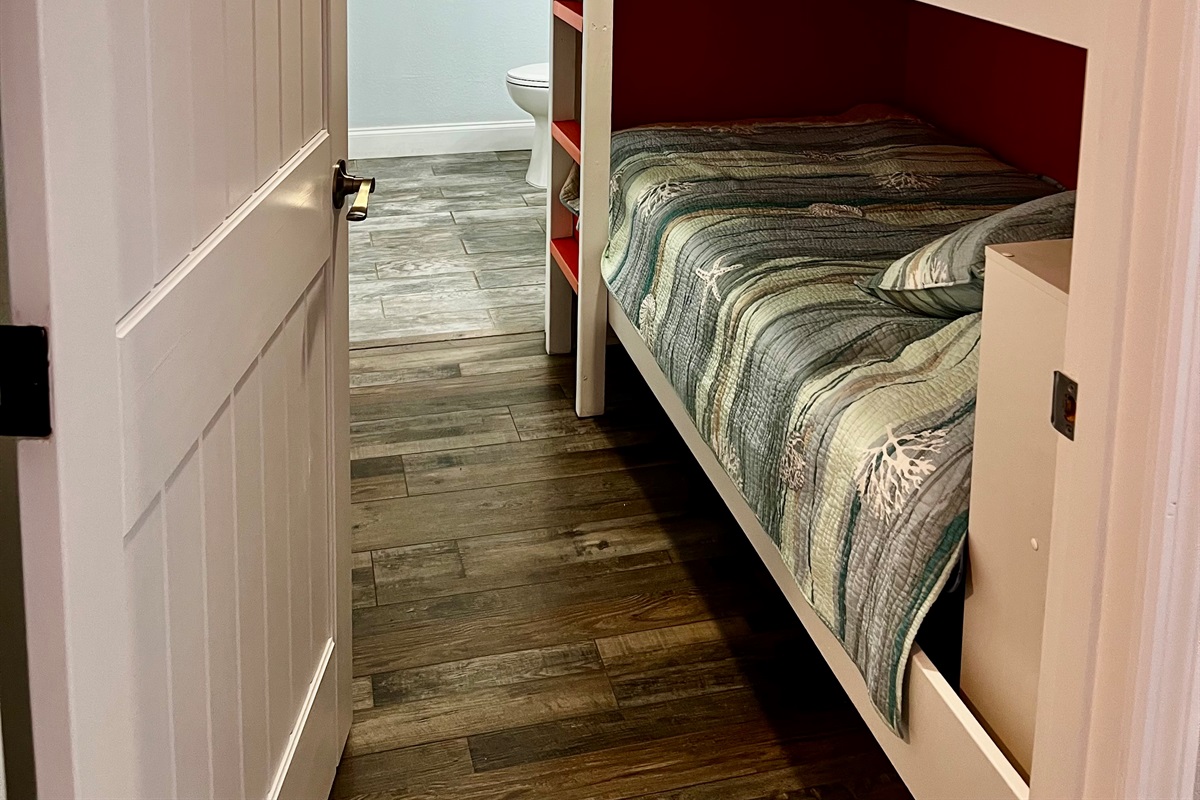 Bunk bedroom- privacy door. And 3rd bathroom right next to them