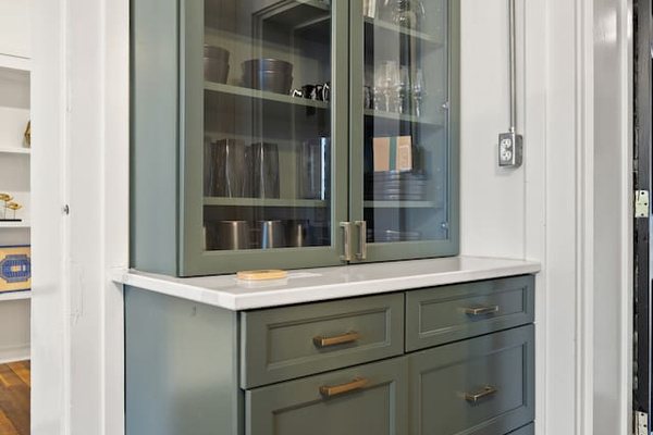 Plenty of cabinets with plenty of necessary kitchen items