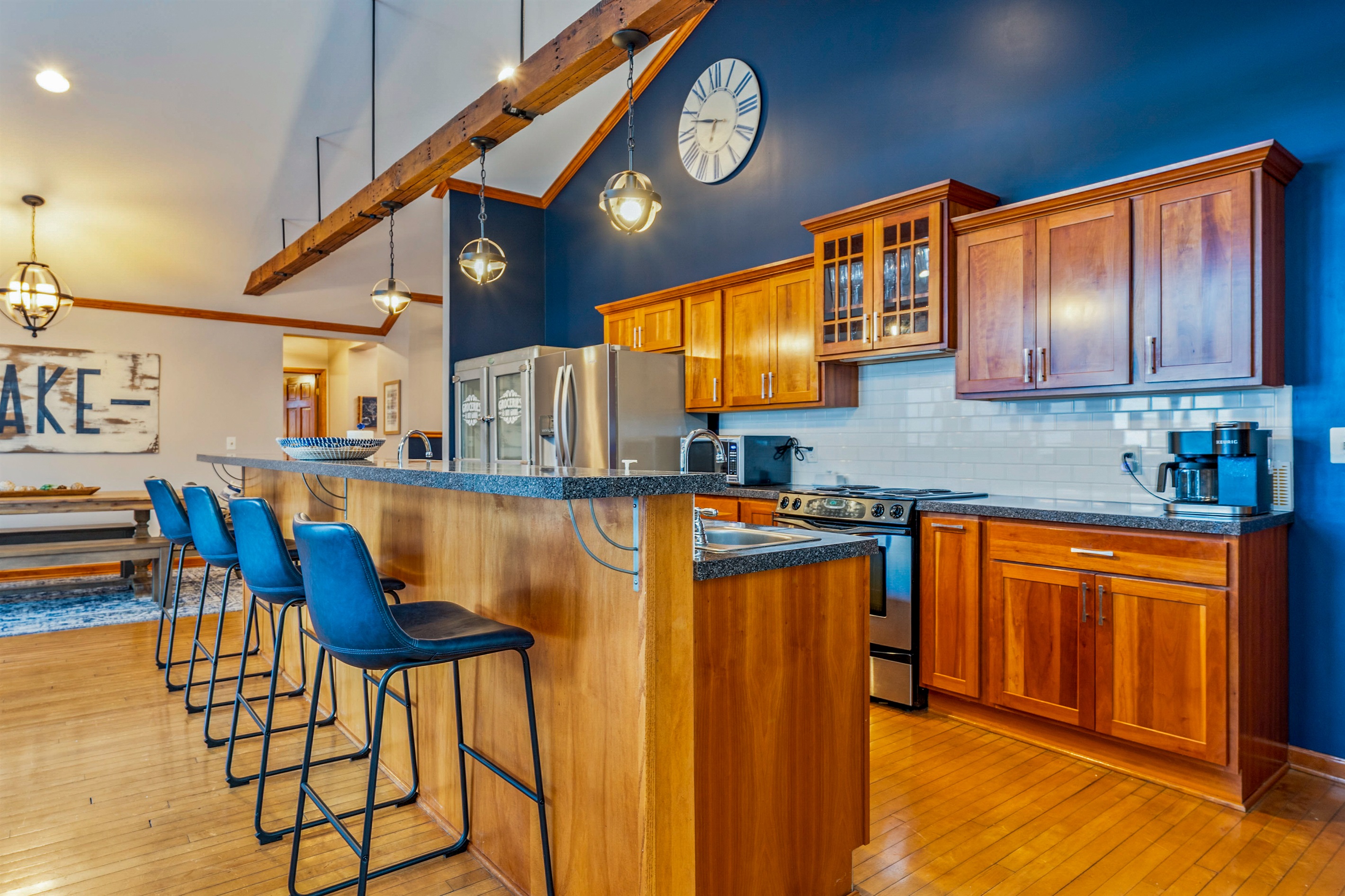 Open concept kitchen dining and living space