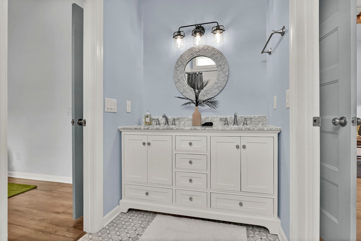 This bathroom is shared between Bedroom #2 and Bedroom #3