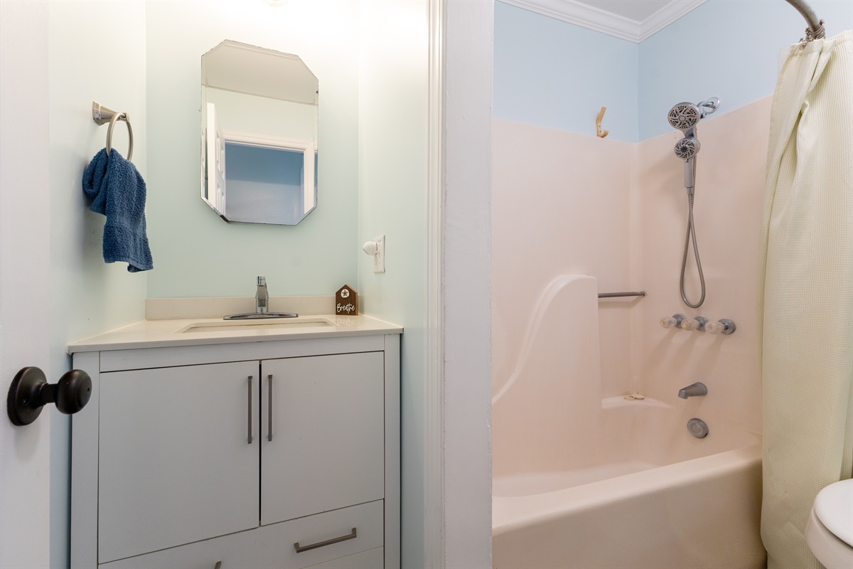 Combination of tub/shower and toilet