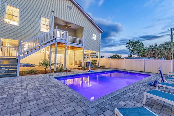 Dive into luxury with our sprawling 12x25 heated pool, aglow with mesmerizing LED lights. Experience the epitome of indulgence in your own backyard sanctuary. 🌟💦 #LuxuryLiving #PoolPerfection