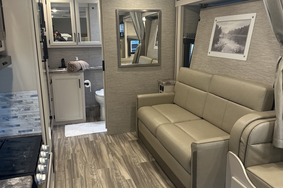 View of sofa and bathroom