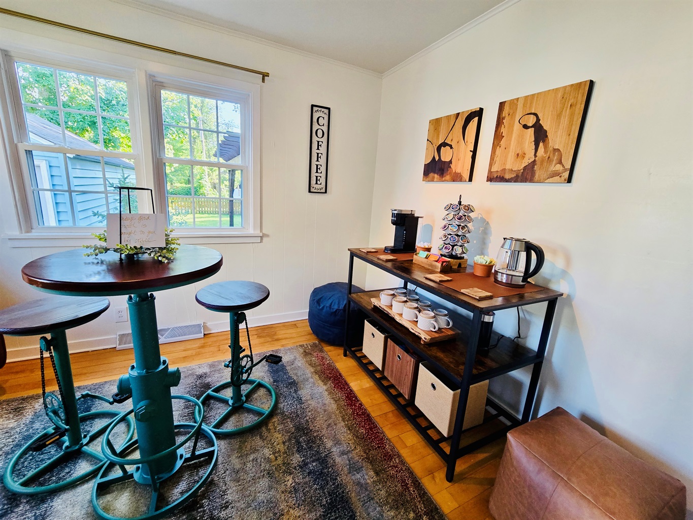 Start your day in style—our industrial-chic morning nook features a high table, quirky bike-pedal stools, and a fully stocked coffee station for your perfect brew.