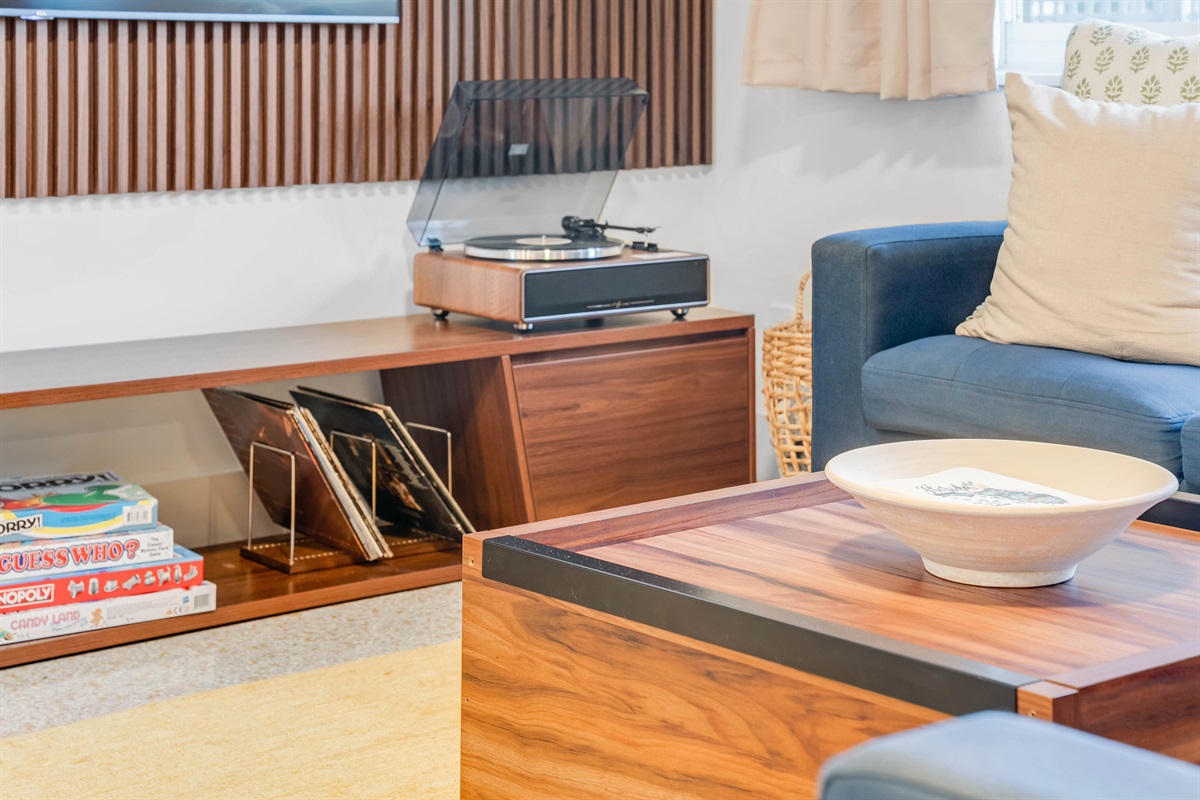 🎶 Drop the needle, roll the dice — vintage beats and game night vibes await with your own record player.