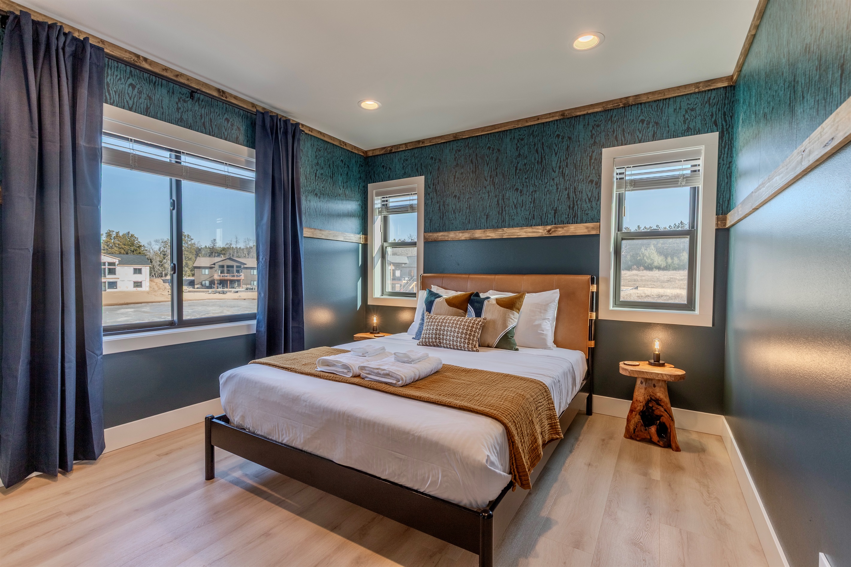 Upstairs queen memory foam bedroom with Roku TV.