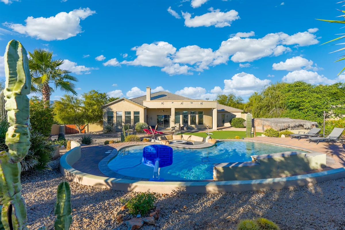 Bright daytime pool views with plenty of space to swim, lounge, and unwind.