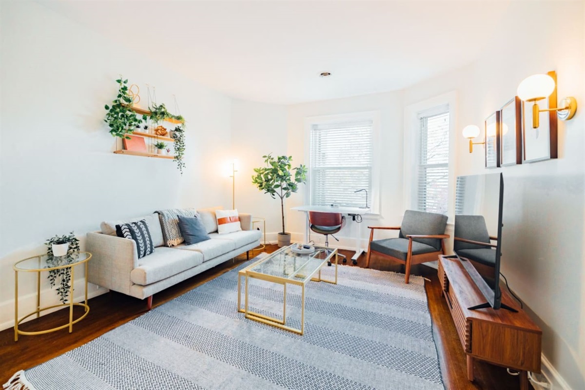 Alex's place was spacious and comfortable. The decor was very appealing. I lost count of the green plants and wall hangings. The living room windows overlook a historic church just a few feet away. - Stefan, 5 Star Review.