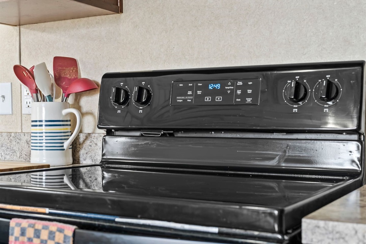 Clean and functional cooktop with easy-to-use controls and ample prep space for everyday cooking.