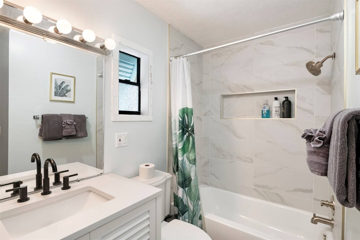 Palm Themed 2-Queen Suite private bathroom.