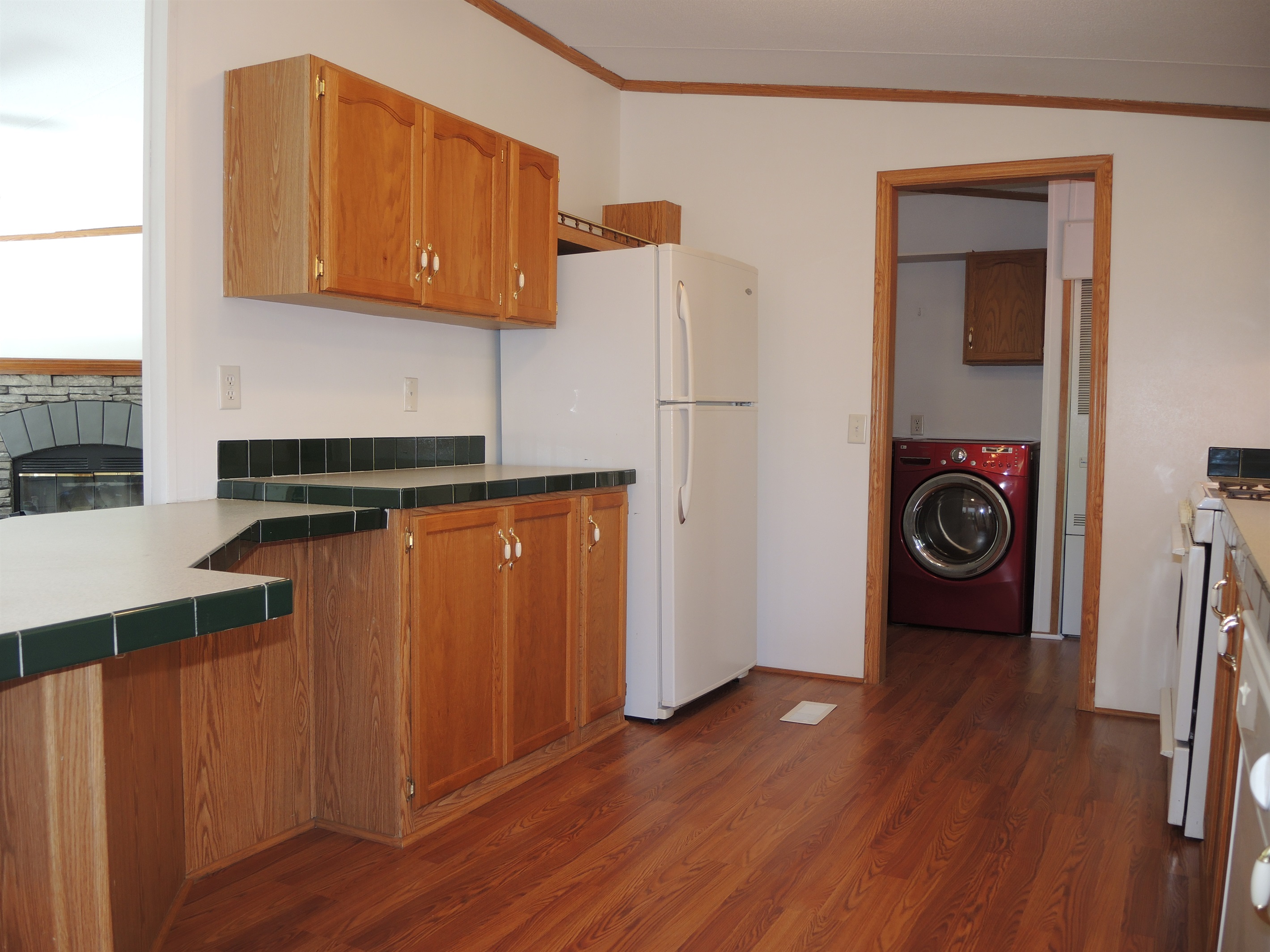 Kitchen and laundry beyond